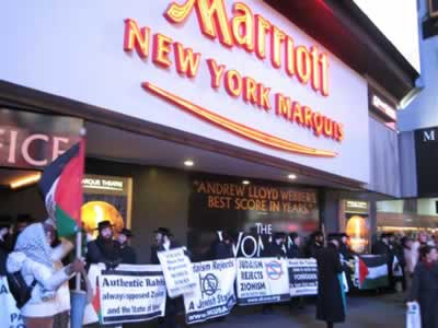 Al-Awda NY was joined by Neturei Karta and supporters of Palestine to protest the Zionist Organization of America’s banquet at the Marriott Marquis, December 11, 2005: