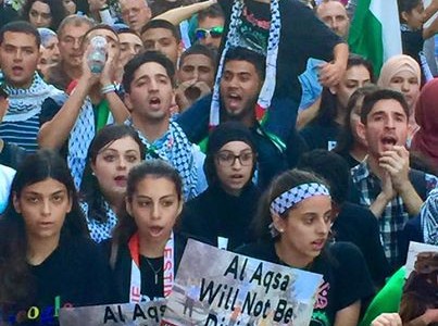 Hundreds from Al-Awda New York and other area groups rallied in Times Square on Friday to protest days of Zionist attacks on al-Aqsa mosque in occupied al-Quds/Jerusalem.